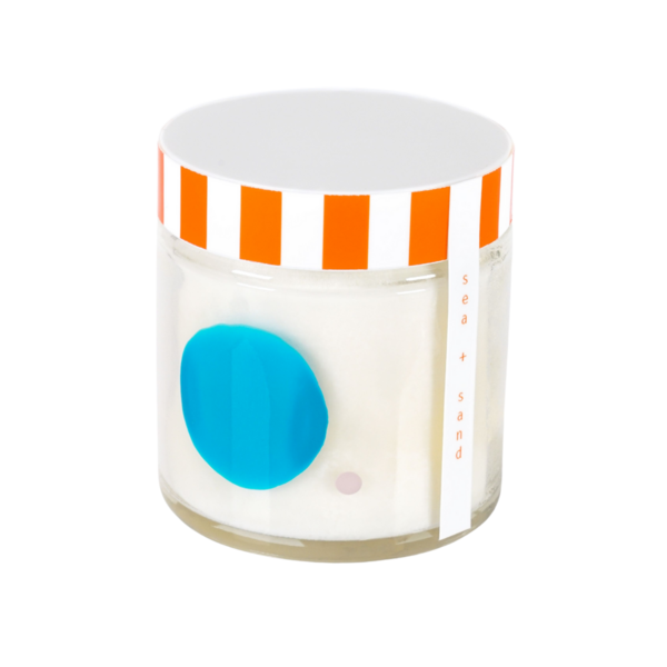 Product images of to:from natural soy candles in various scents and colors