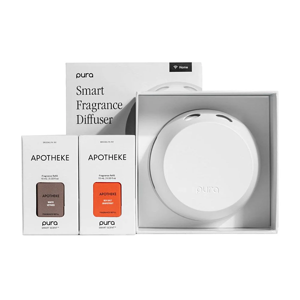 Product and lifestyle images of APOTHEKE Firewood Mini Candle Diffuser Duo Set, with moody lighting and home decor props