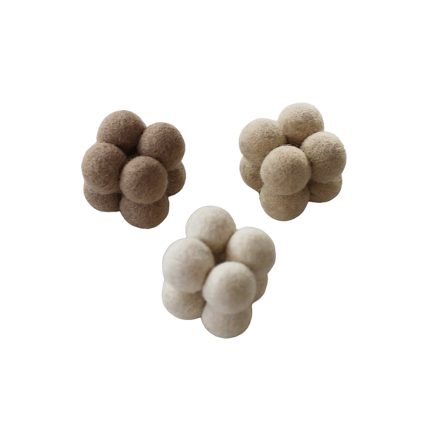 Product and lifestyle images of toy bundle including Pearl Enrichment Toys and Flora Cat Wand